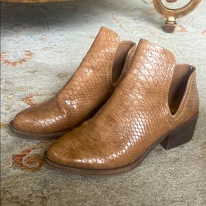 Volatile snake skin booties